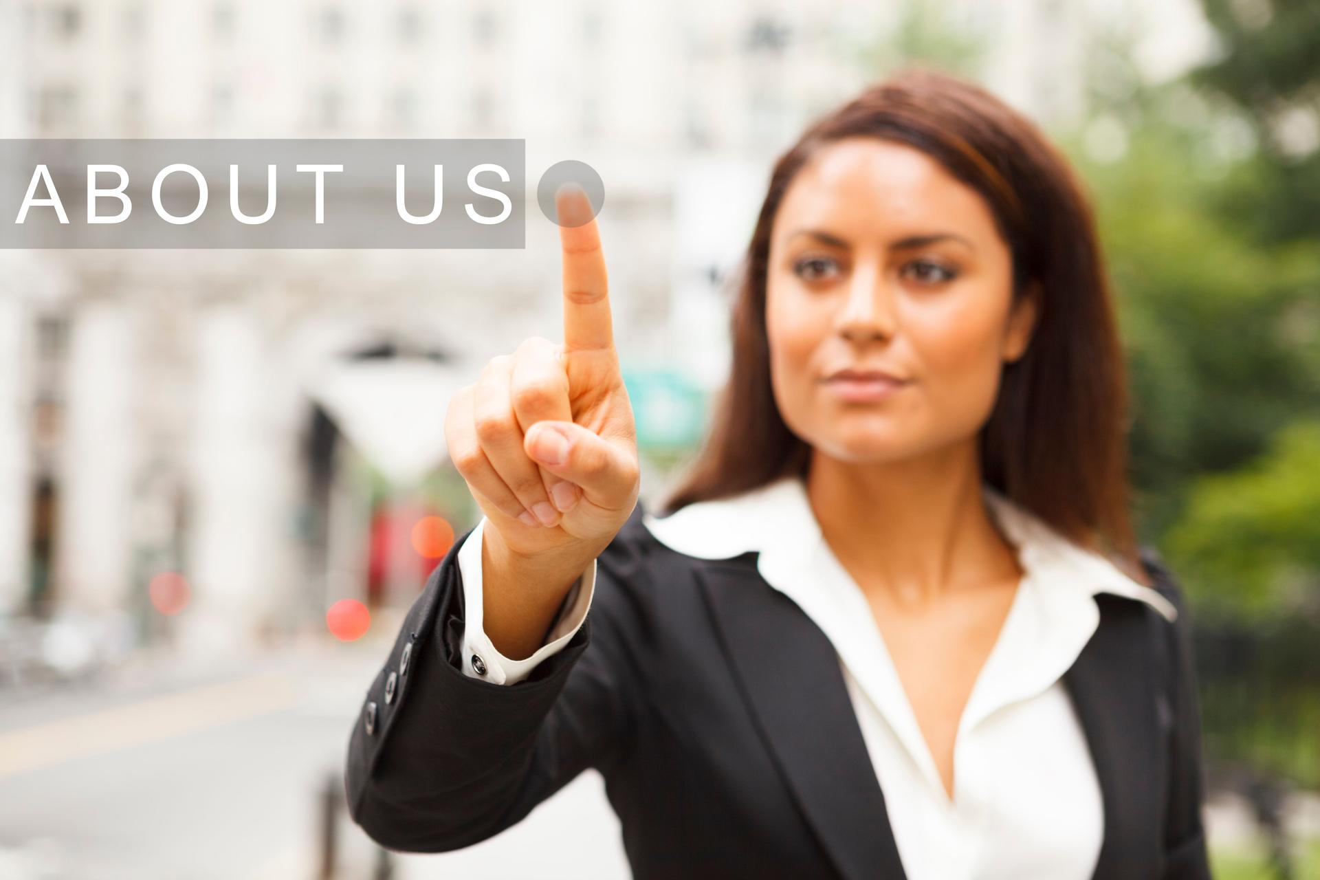 Young Woman Presses ABOUT US Button
